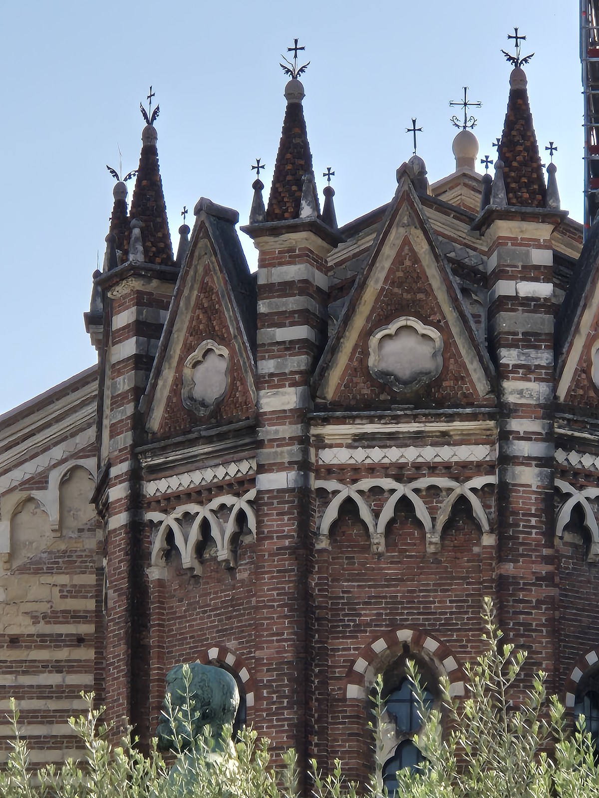 Pointed gables and decorative brickwork of a church